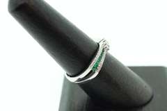 Flowing Channel Set 18k White Gold Emerald and Diamond Ring with Triple-Stone Center
