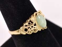 Ornate Green Stone Ring in Yellow Gold