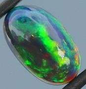 Outstanding 3.10ct full body flashing Black Opal