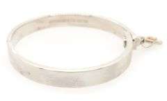 Tiffany & Co. Hinge Lock Bangle Bracelet in 18K and Sterling