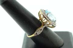 Gentle Blue Topaz Ring with Gold Plated Silver and Diamond Accents