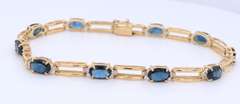 Attractive Yellow Gold Blue Sapphire and Diamond Tennis Bracelet