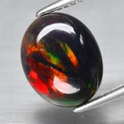 Magnificent 1.63ct full body flashing Black Opal