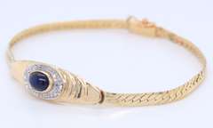 Lovely Yellow Gold Cab Oval Sapphire and Diamond Halo Bracelet