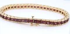 Attractive Yellow Gold Garnet Channel Set Bracelet