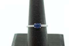 Phenominal Sapphire 18k White Gold Ring with Channel Set Diamonds