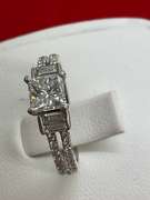CERTIFIED 14K WHITE GOLD DIAMOND ENGAGEMENT RING.