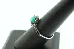 Melancholy Emerald Teardrop 18k White Gold Ring infused with Deep Black Diamonds