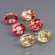 Spooky! 3.22ct fancy orange Songean Sapphire set