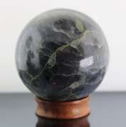 Substantial 1,611ct sphere cut galaxy patterned Iolite
