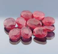 Heavy 45.94ct oval cut Ruby set