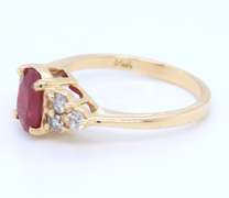 Pleasing Yellow Gold Oval Ruby and Diamond Ring
