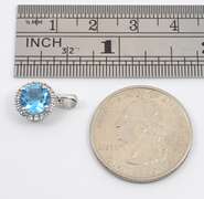 Bright Blue Topaz and Diamond Pendant