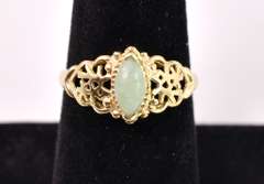 Ornate Green Stone Ring in Yellow Gold