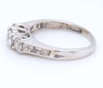 Attractive White Gold Diamond Ring with Channel Sides