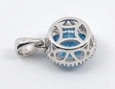 Bright Blue Topaz and Diamond Pendant