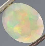 Excellent glittering 1.88ct faceted Jelly Opal