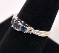 Stunning Three Stone Sapphire Ring in White Gold