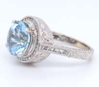 Wonderful White Gold Aquamarine and Diamond Halo Ring