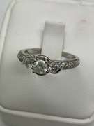 LADIES 14K WHITE GOLD AND DIAMOND RING
