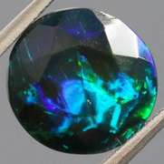 Glittering multi pattern flashing 1.84ct Welo black Opal