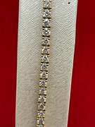 CERTIFIED 18K GOLD AND DIAMOND TENNIS BRACELET