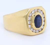 Handsome Yellow Gold oval Sapphire and Diamond Channel Halo Ring