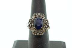 Impeccable Sapphire Ring with Intricate Diamond Studs on top Gold Plated Silver