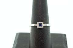 Regal Sole Sapphire 18k White Gold Ring Bordered with Diamonds