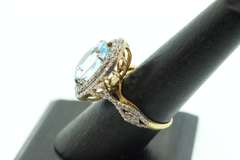 Gentle Blue Topaz Ring with Gold Plated Silver and Diamond Accents