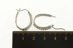 10K White Gold 0.50 Ctw Pave Diamond Encrusted Oval Hoop Earrings