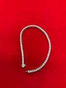 CERTIFIED 18K GOLD AND DIAMOND TENNIS BRACELET