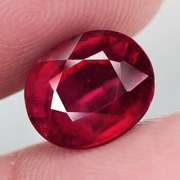 Stunning 7.14ct deep blood red Ruby center stone