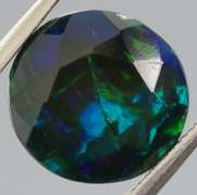 Glittering multi pattern flashing 1.84ct Welo black Opal