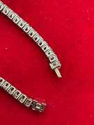 CERTIFIED 18K GOLD AND DIAMOND TENNIS BRACELET