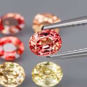 Spooky! 3.22ct fancy orange Songean Sapphire set