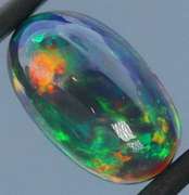 Outstanding 3.10ct full body flashing Black Opal