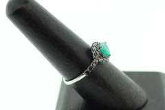 Melancholy Emerald Teardrop 18k White Gold Ring infused with Deep Black Diamonds