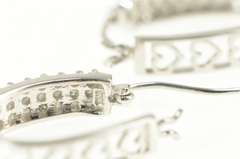 10K White Gold 0.50 Ctw Pave Diamond Encrusted Oval Hoop Earrings
