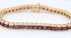 Attractive Yellow Gold Garnet Channel Set Bracelet