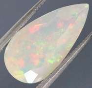 Wonderful glittering collectors 1.82ct faceted Jelly Opal