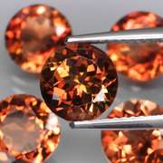 Gorgeous round cut 11.59ct Imperial Topaz set
