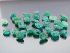 Heavy 236ct collection of Emeralds