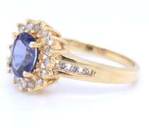 Romantic Yellow Gold oval Shaped Tanzanite and Diamond Ring