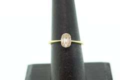 Eye-Pleasing 18kt Yellow Gold Oval Shaped Diamond Ring