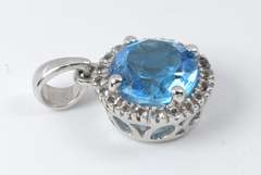 Bright Blue Topaz and Diamond Pendant