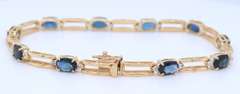 Attractive Yellow Gold Blue Sapphire and Diamond Tennis Bracelet