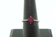 Enrapturing Four Square Ruby 18k White Gold Ring flanked with Diamonds