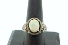 Mesmerizing Diamond Accented Gold Plated Silver Opal Ring