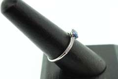 Phenominal Sapphire 18k White Gold Ring with Channel Set Diamonds